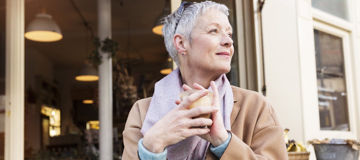 Businesswoman having coffee